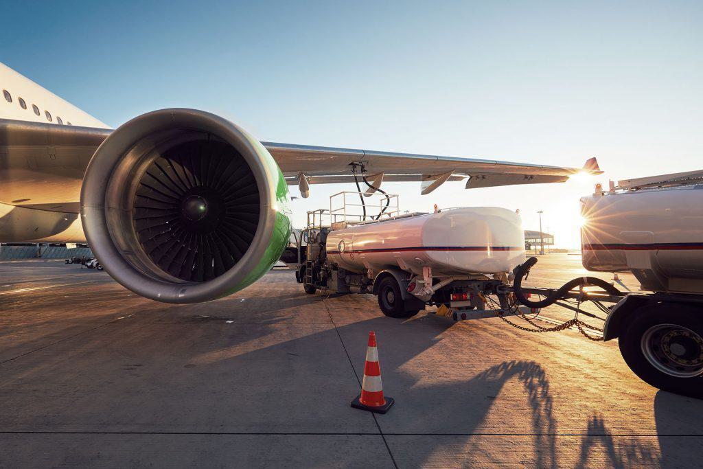 Fueling Aircraft Wing with Fuel Trucks 1